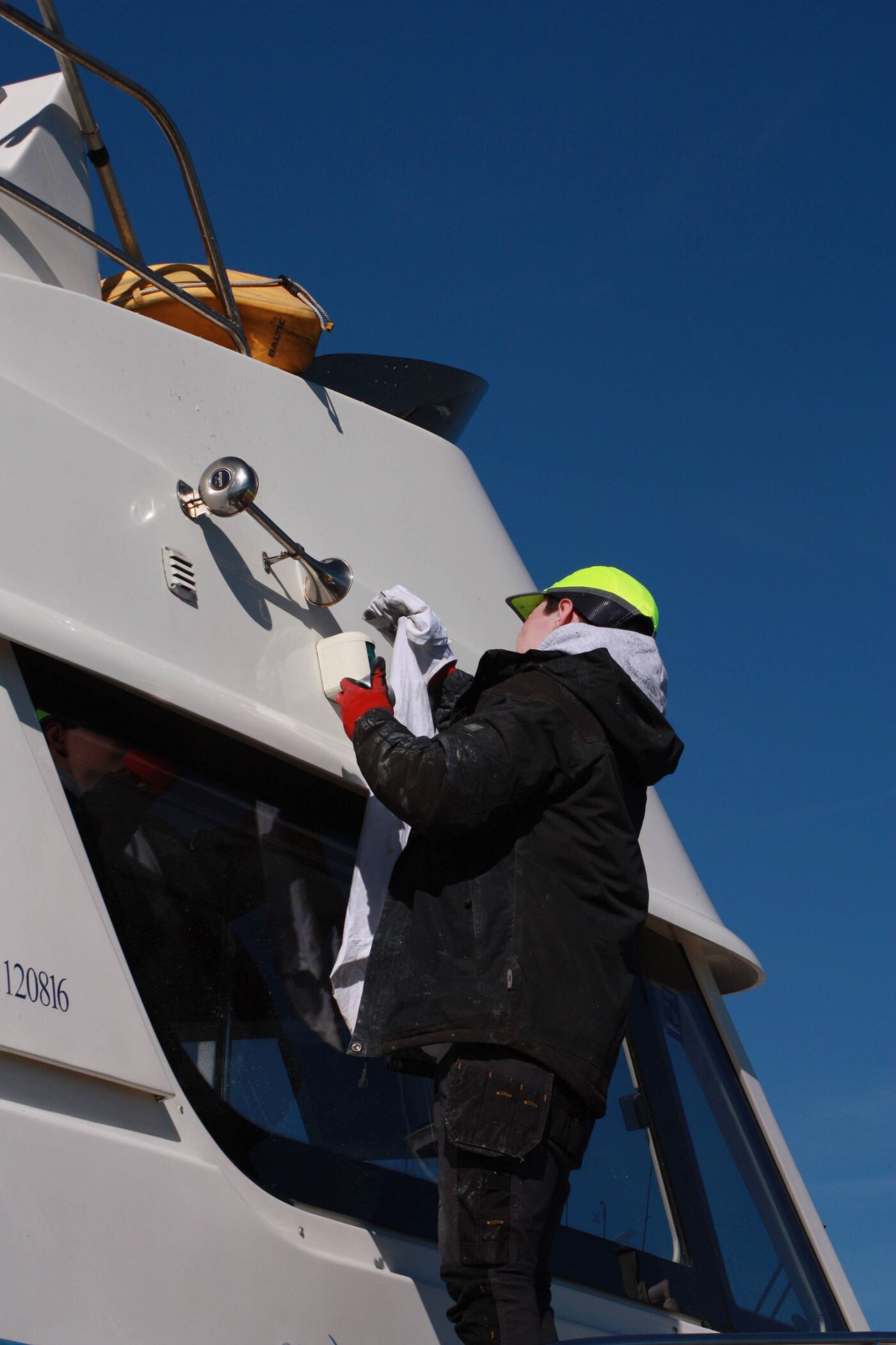 Boat being lifted by hoist at Malahide Marina